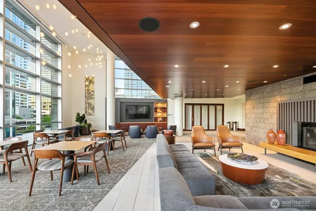 a living room with fireplace furniture and a flat screen tv