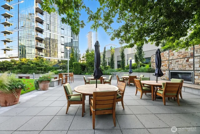 a view of a livingroom with furniture and staircase