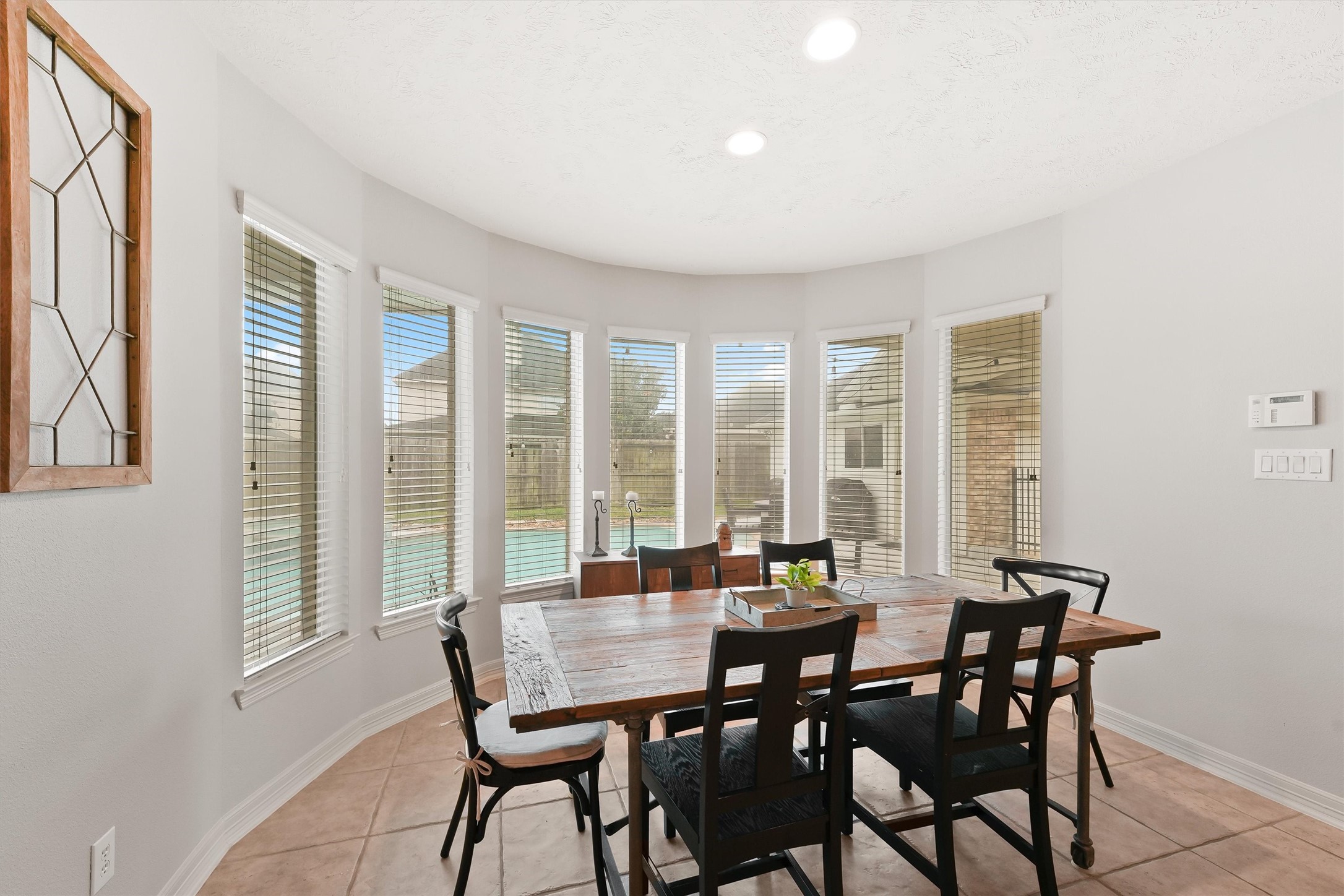 2818 Shallow Springs Court Manvel, TX 77578 - Photo 12 of 41 a view of a dining room with furniture and window