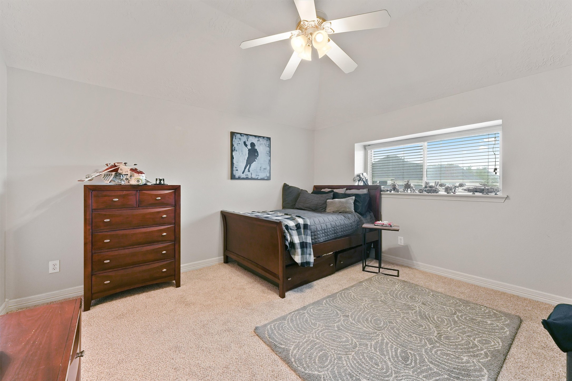2818 Shallow Springs Court Manvel, TX 77578 - Photo 27 of 41 a living room with furniture and a baby crib