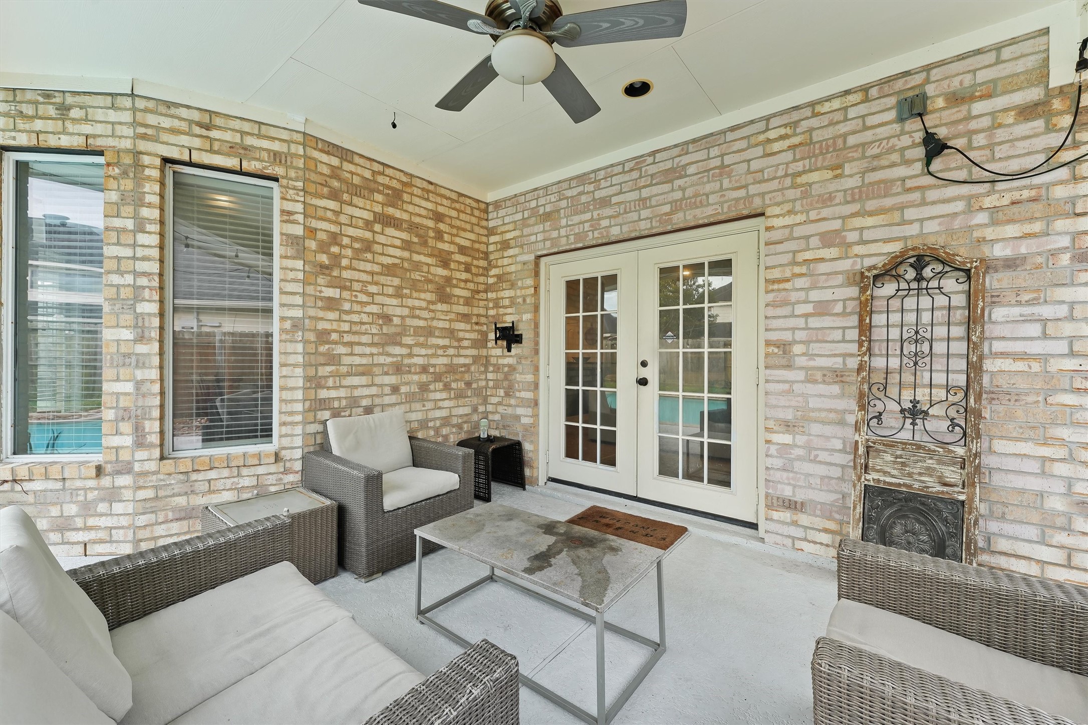 2818 Shallow Springs Court Manvel, TX 77578 - Photo 36 of 41 a living room with furniture windows and a fireplace