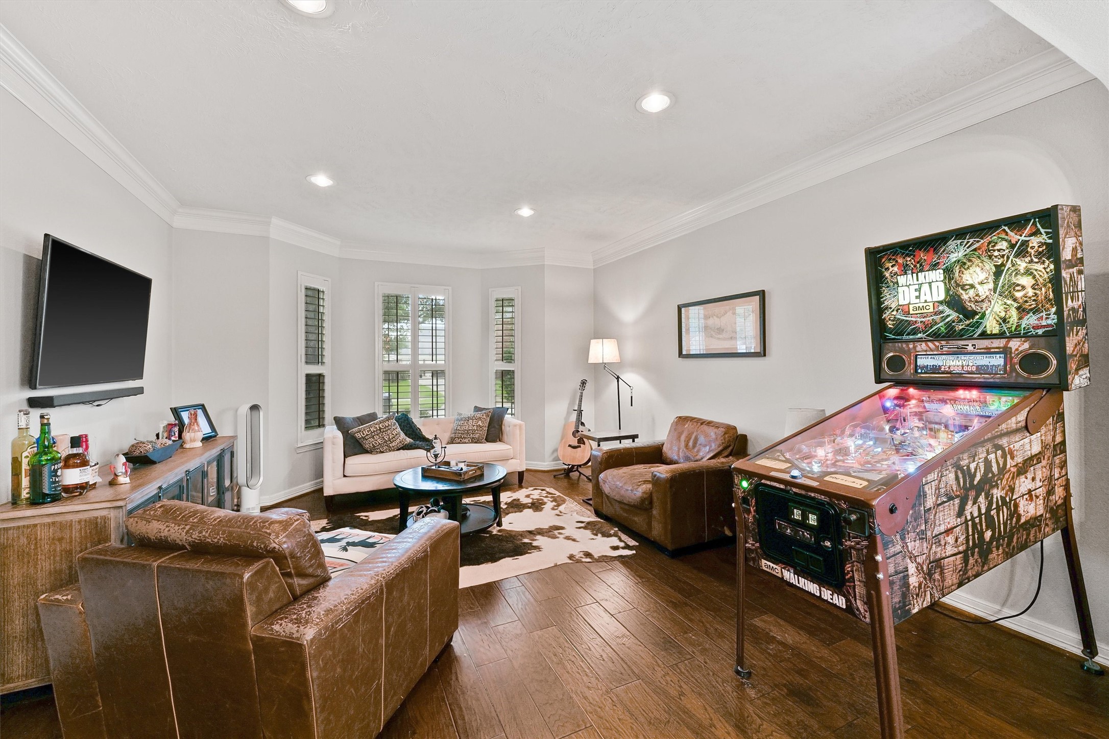 2818 Shallow Springs Court Manvel, TX 77578 - Photo 6 of 41 a living room with furniture and a flat screen tv