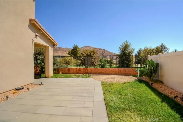 a view of swimming pool with a yard