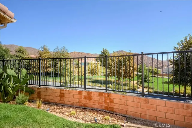 a view of a balcony with a lake view