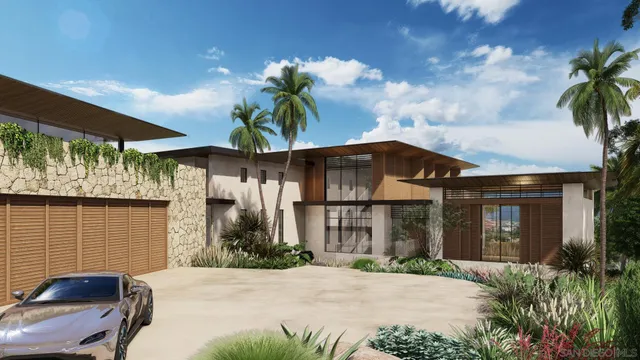 a front view of a house with a yard and potted plants