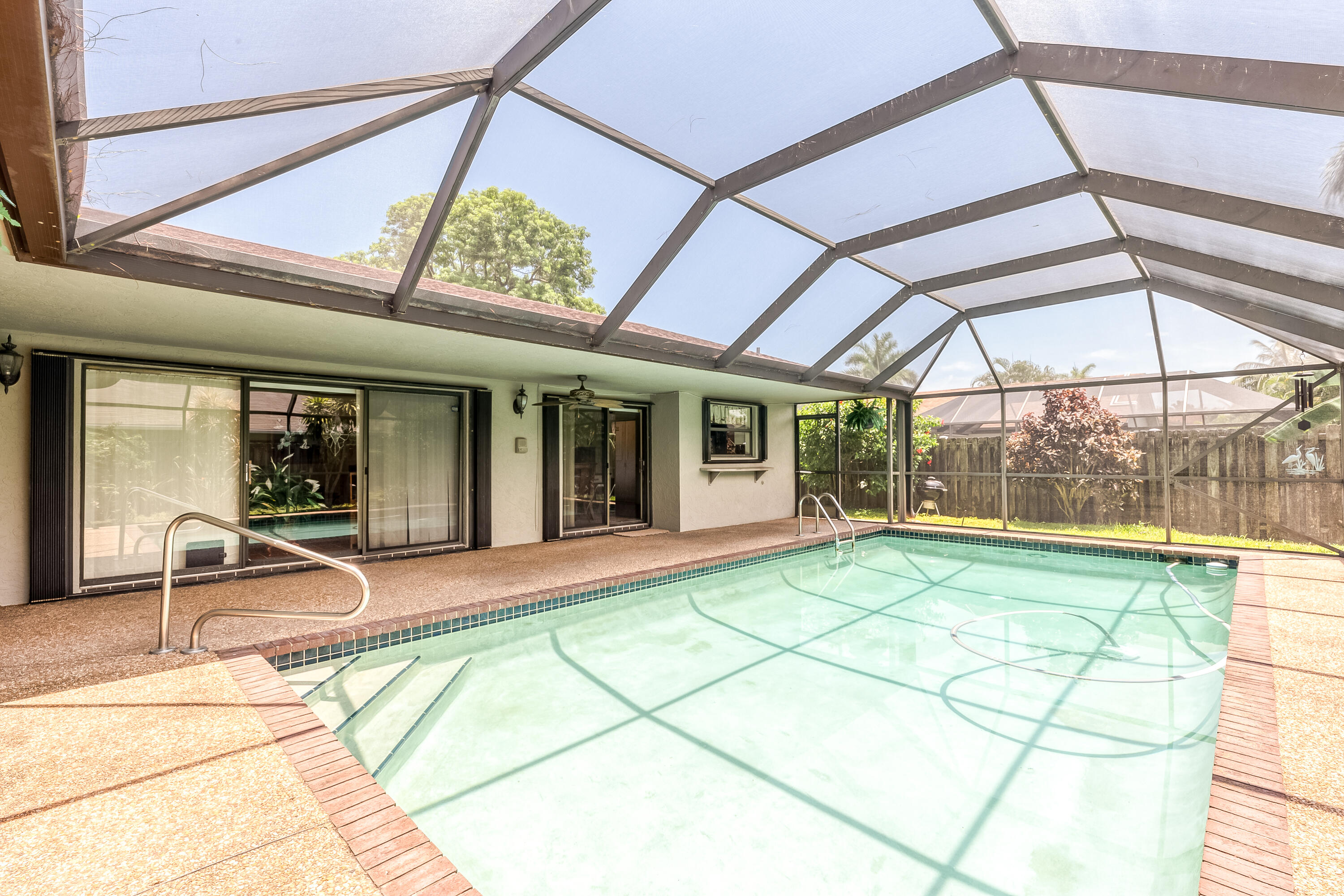 3375 Northwest 28th Terrace Boca Raton, FL 33434 - Photo 42 of 45 Screened Pool
