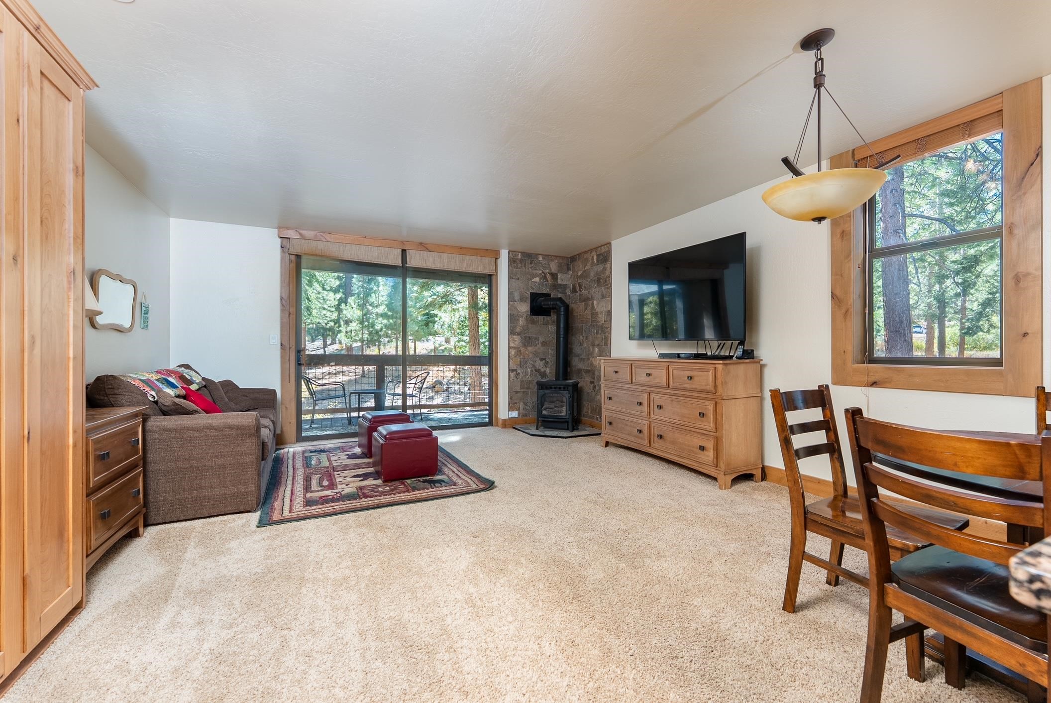 3151 Aspen Grove Truckee, CA 96161 - Photo 3 of 18 a living room with furniture and a large window