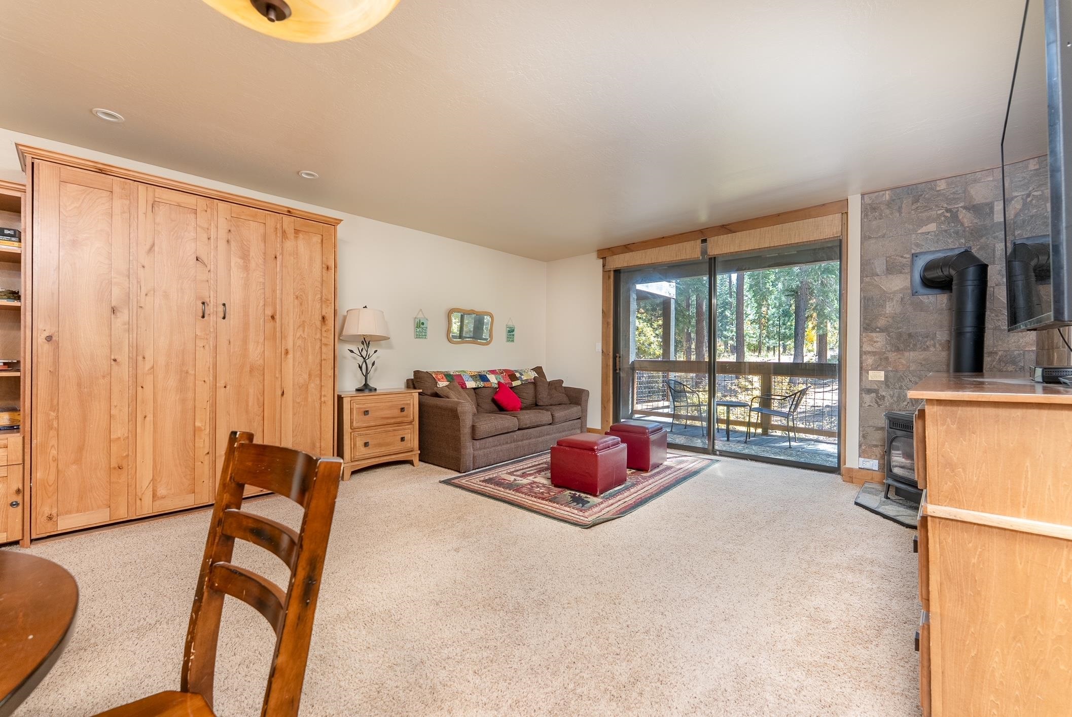 3151 Aspen Grove Truckee, CA 96161 - Photo 4 of 18 a bedroom with furniture and a large window