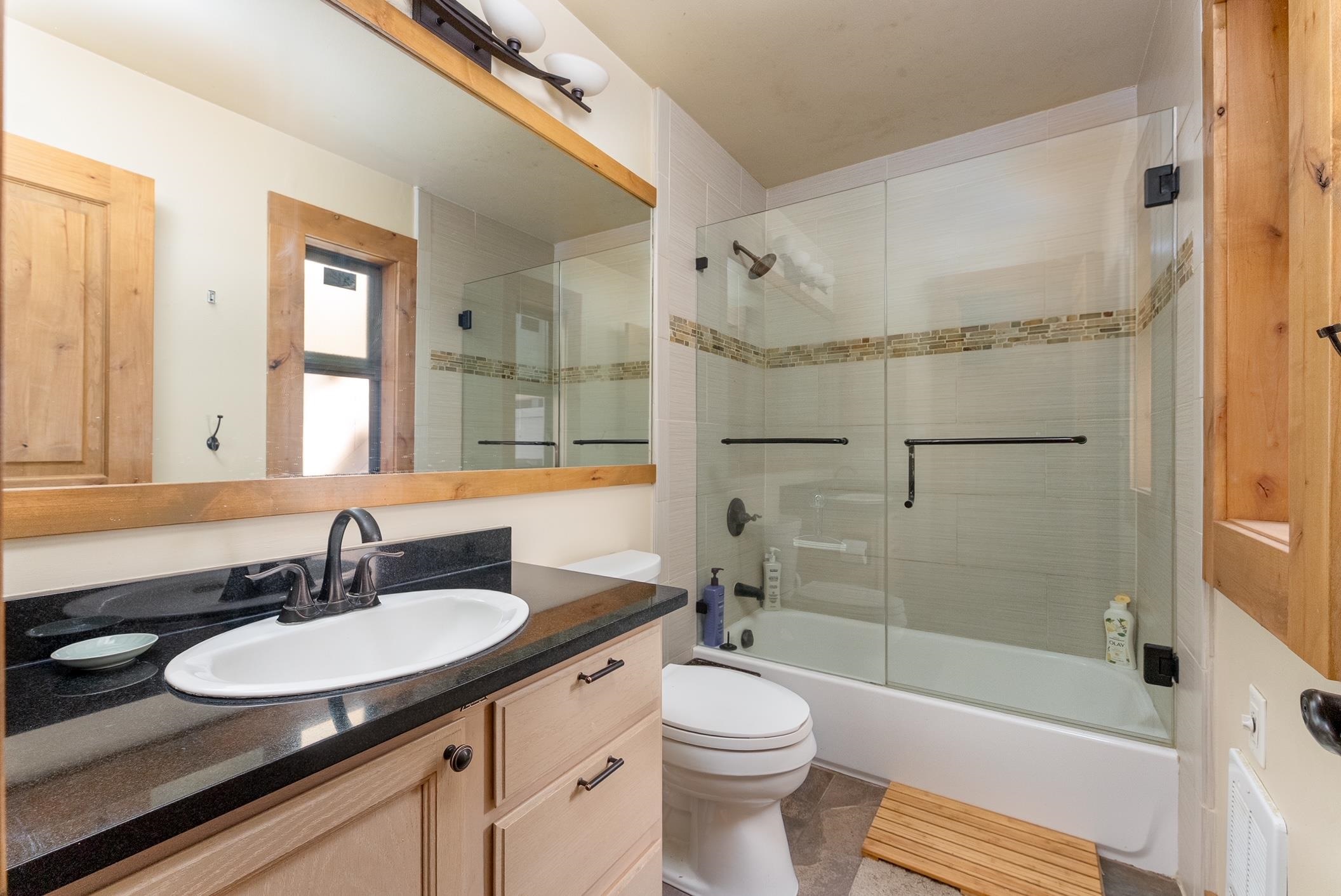 3151 Aspen Grove Truckee, CA 96161 - Photo 9 of 18 a bathroom with a sink and a mirror