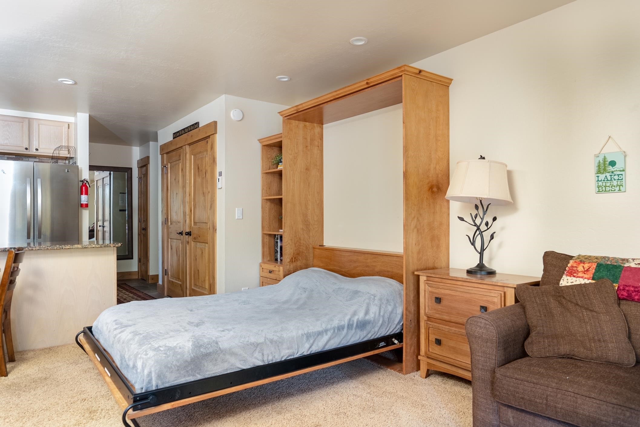 3151 Aspen Grove Truckee, CA 96161 - Photo 10 of 18 a bedroom with a bed and a couch