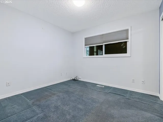 a view of a livingroom with an empty space