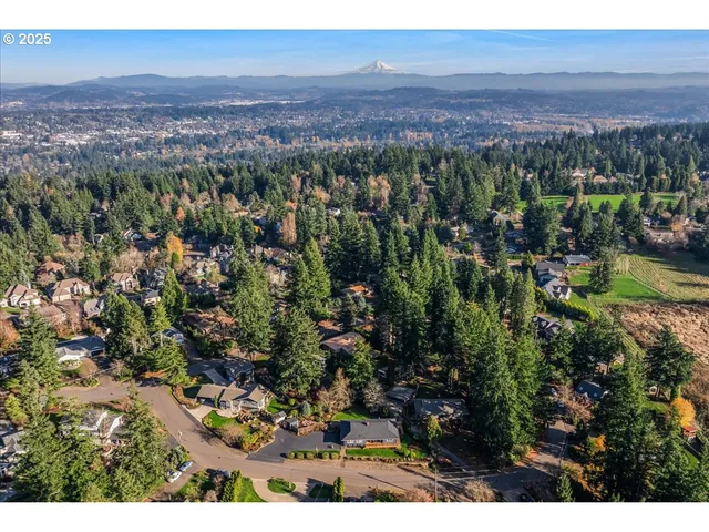 a picture of a room with a white wall and a picture of the wall