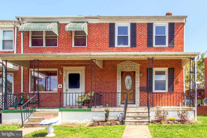 543 Welbrook Road Baltimore, MD 21221 - Photo 1 of 28 front view of building with a yard