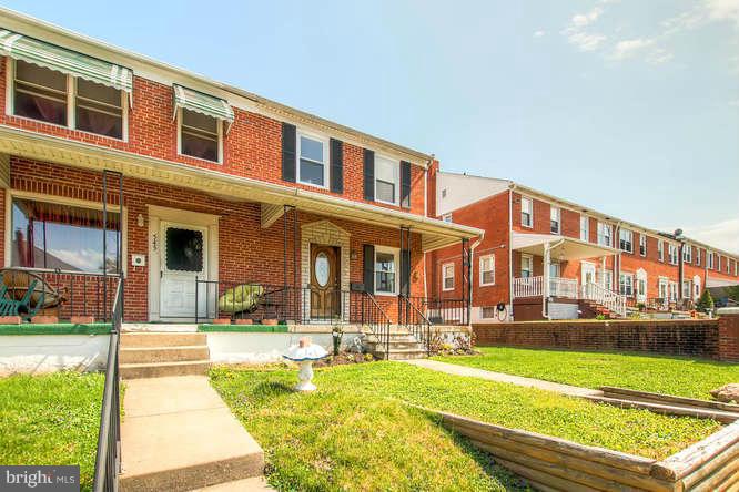 543 Welbrook Road Baltimore, MD 21221 - Photo 2 of 28 a view of a building with a swimming pool