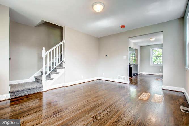 543 Welbrook Road Baltimore, MD 21221 - Photo 6 of 28 a view of empty room with wooden floor