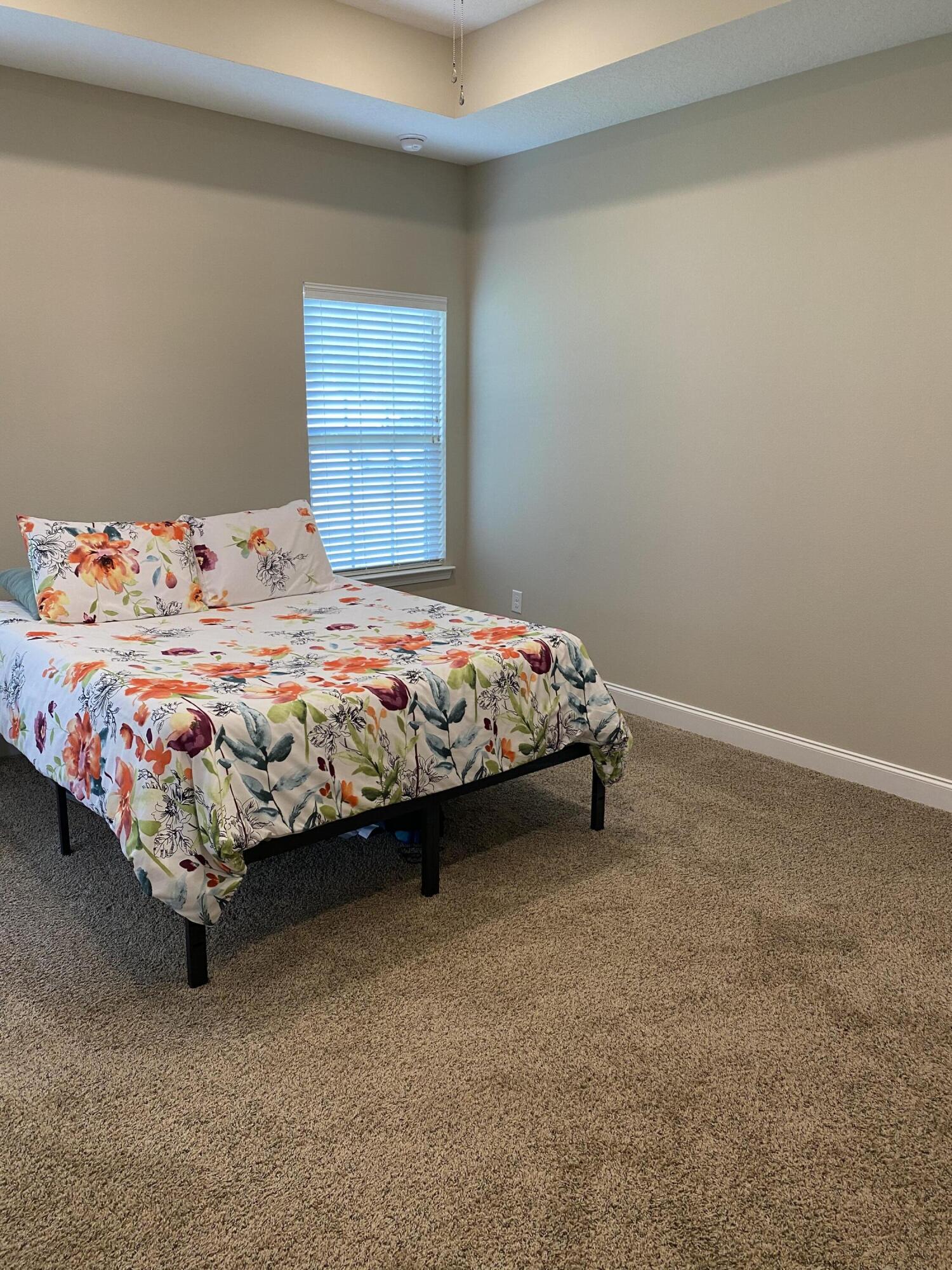 6191 Timberland Ridge Drive Crestview, FL 32539 - Photo 36 of 76 a bedroom with a bed and dresser