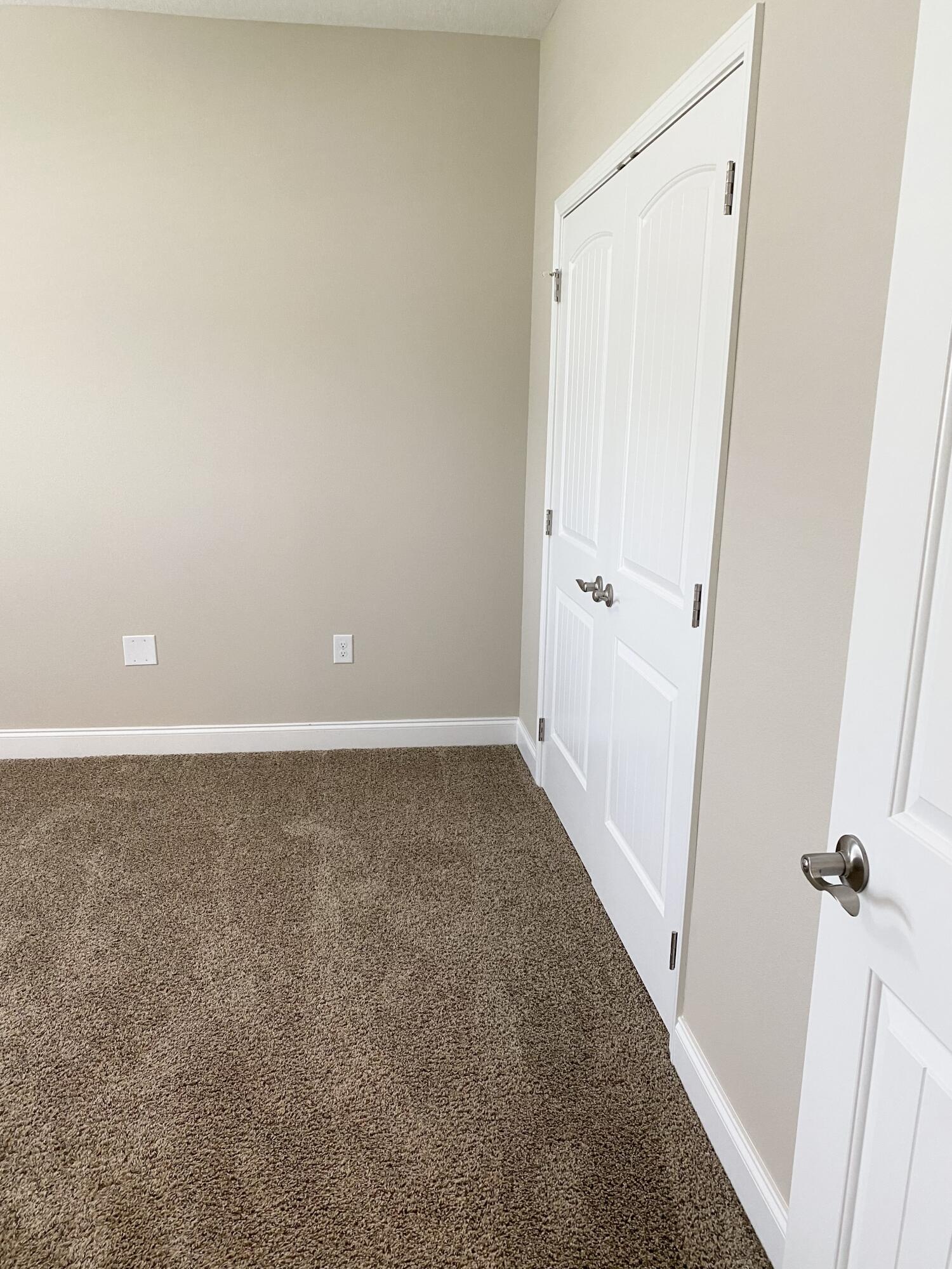 6191 Timberland Ridge Drive Crestview, FL 32539 - Photo 49 of 76 a view of a room with a wooden door