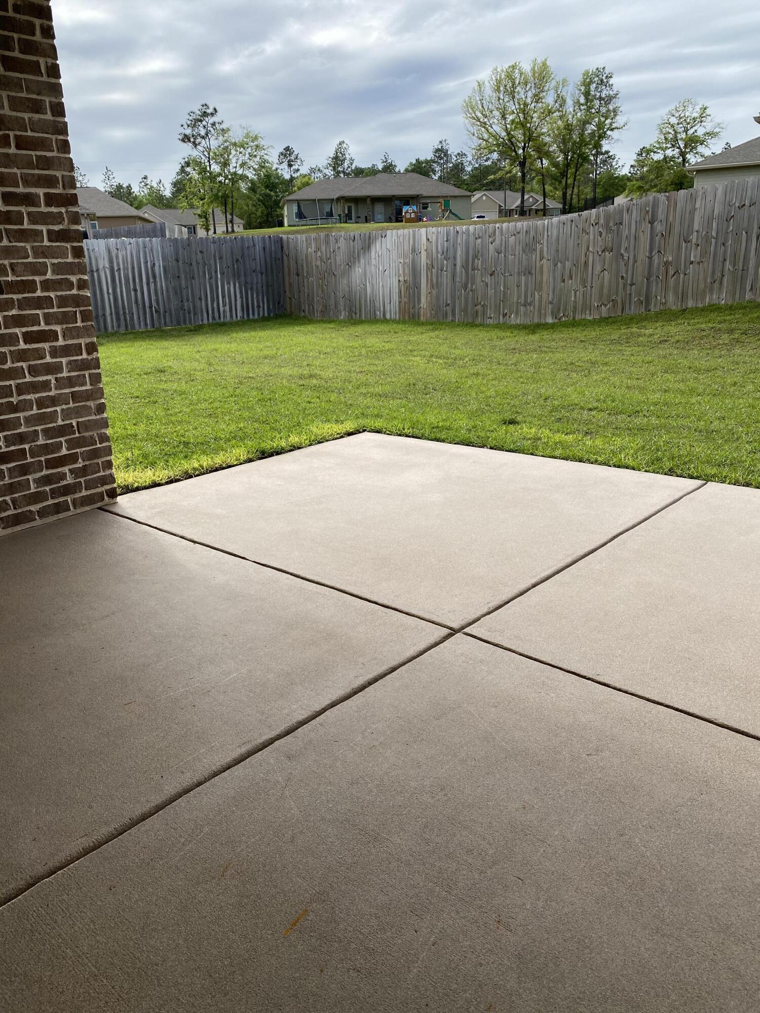 6191 Timberland Ridge Drive Crestview, FL 32539 - Photo 57 of 76 a view of a backyard and yard
