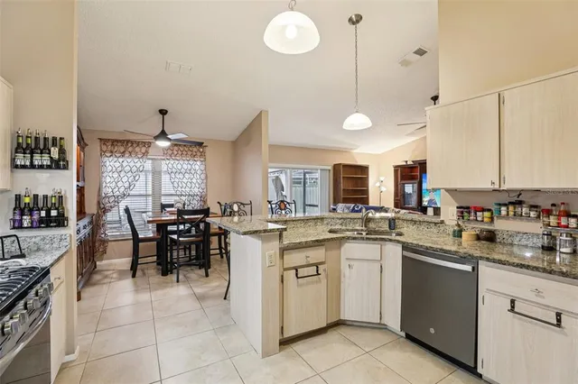 a kitchen with a stove microwave and refrigerator
