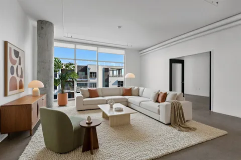 an empty room with a empty space and window