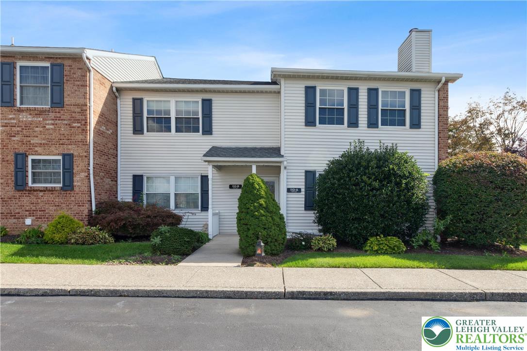 a house view with a garden space