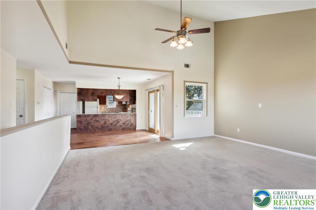 110 Drift Court, Unit B Bethlehem, PA 18020 - Photo 4 of 25 a view of a hallway with a chandelier