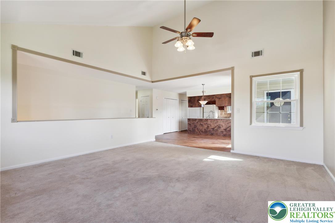 110 Drift Court, Unit B Bethlehem, PA 18020 - Photo 5 of 25 a view of livingroom with hardwood floor and a ceiling fan