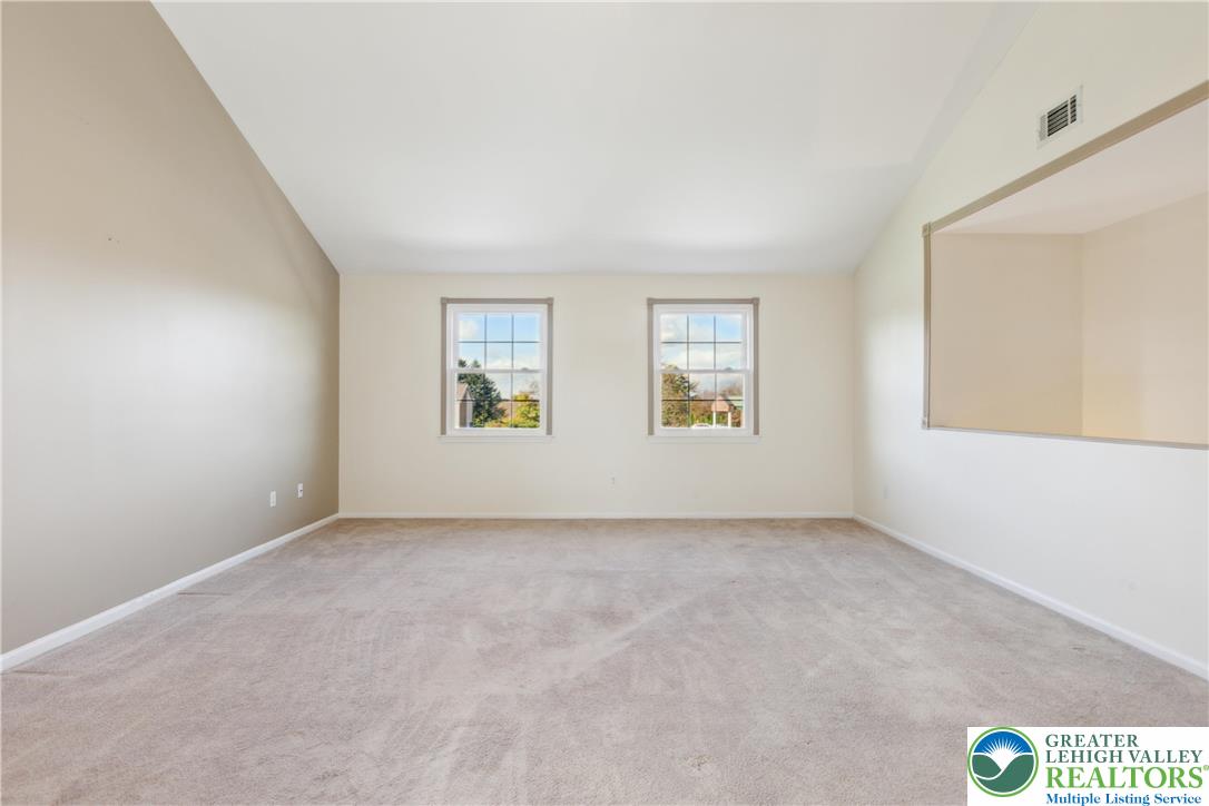 110 Drift Court, Unit B Bethlehem, PA 18020 - Photo 6 of 25 an empty room with windows