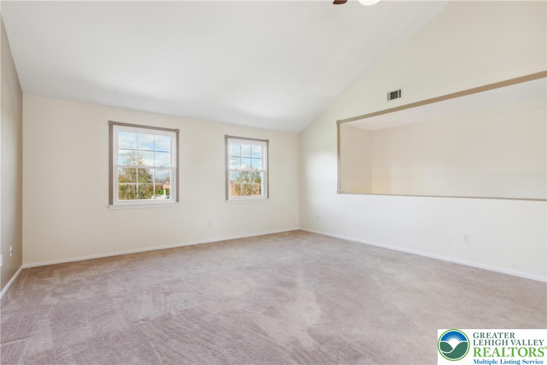 110 Drift Court, Unit B Bethlehem, PA 18020 - Photo 8 of 25 an empty room with windows