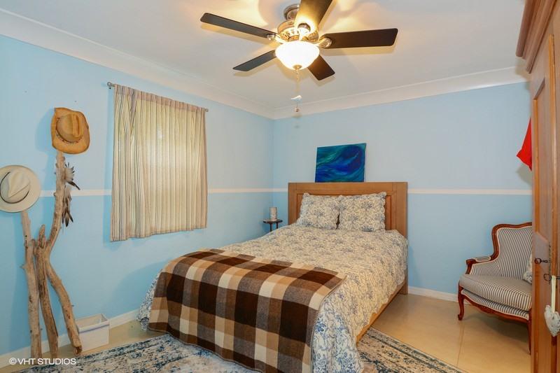 474 Northeast 5th Court Boca Raton, FL 33432 - Photo 11 of 16 12_474NE5thCt_161_4thBedroom_FlexMLS800x