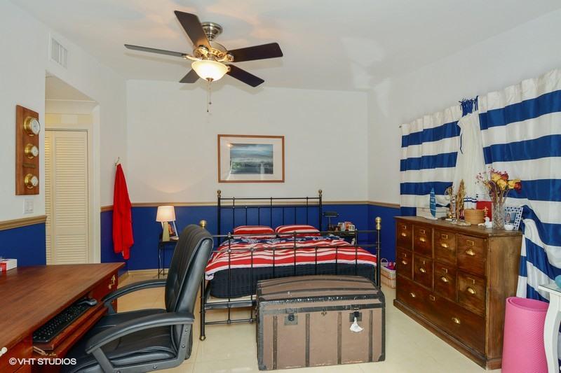 474 Northeast 5th Court Boca Raton, FL 33432 - Photo 8 of 16 08_474NE5thCt_178_MasterBedroom_FlexMLS8
