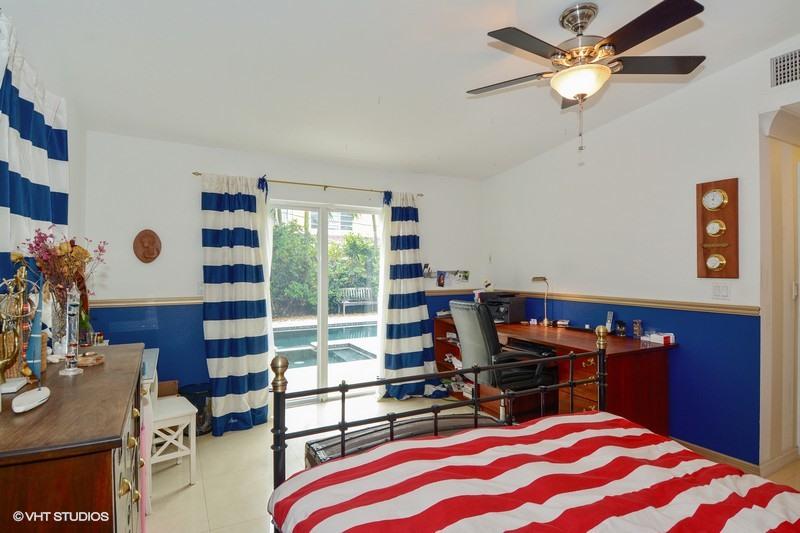 474 Northeast 5th Court Boca Raton, FL 33432 - Photo 9 of 16 07_474NE5thCt_14_MasterBedroom_FlexMLS80