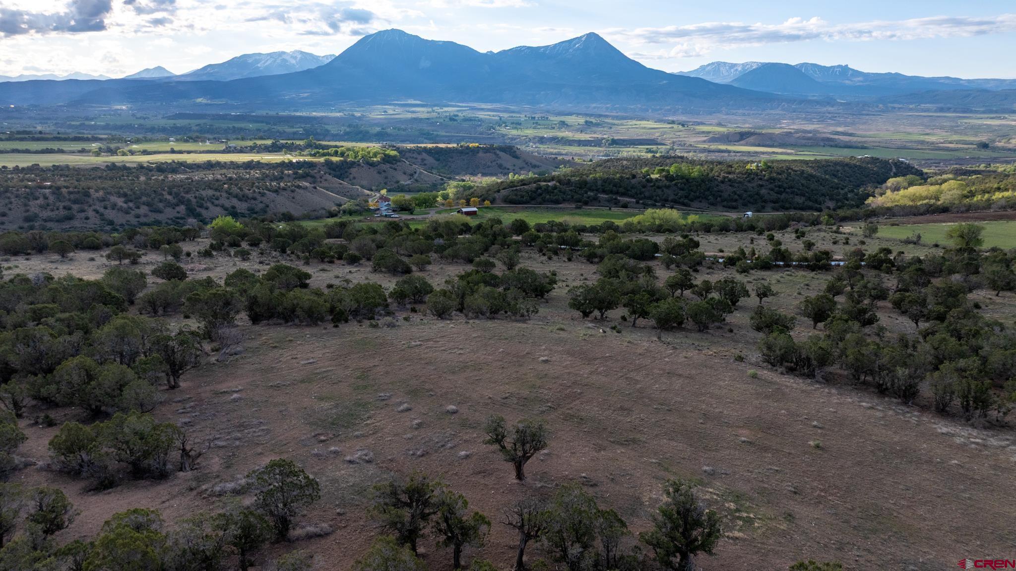 Tbd Powell Mesa Road Hotchkiss, CO 81419 - Photo 14 of 29 a view of a town with mountains in the background