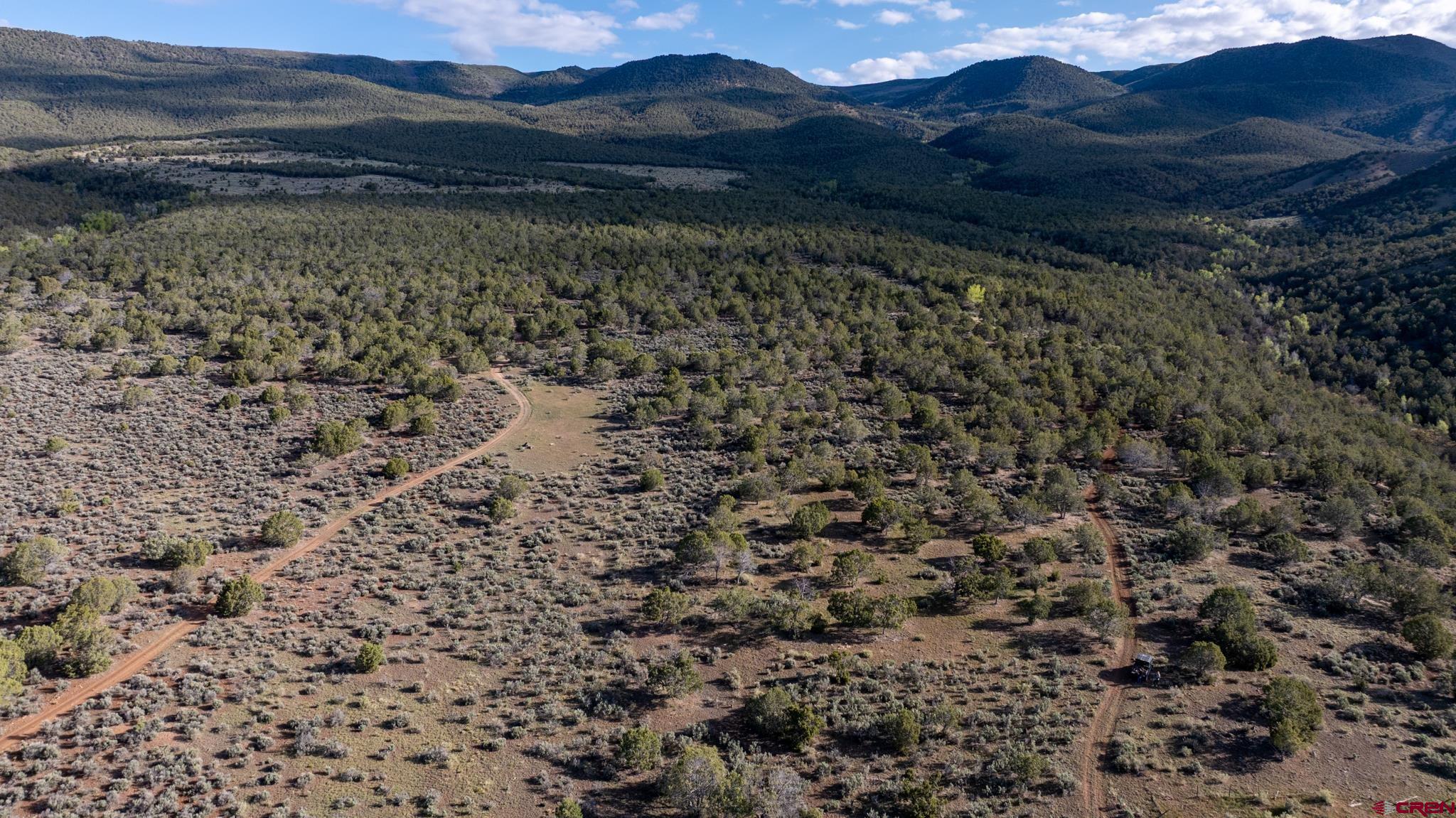 Tbd Powell Mesa Road Hotchkiss, CO 81419 - Photo 15 of 29 a view of a lake with mountains in the background