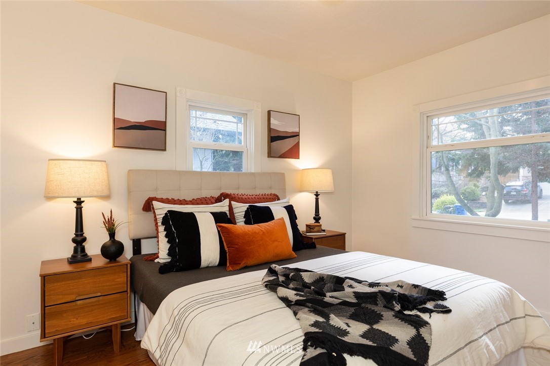 708 North 63rd Street Seattle, WA 98103 - Photo 13 of 24 a bedroom with bed and a window
