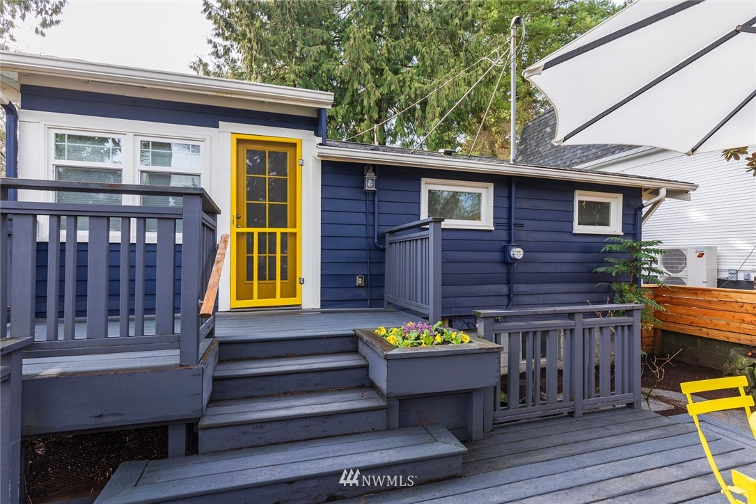 708 North 63rd Street Seattle, WA 98103 - Photo 20 of 24 a view of a chairs setting on the deck