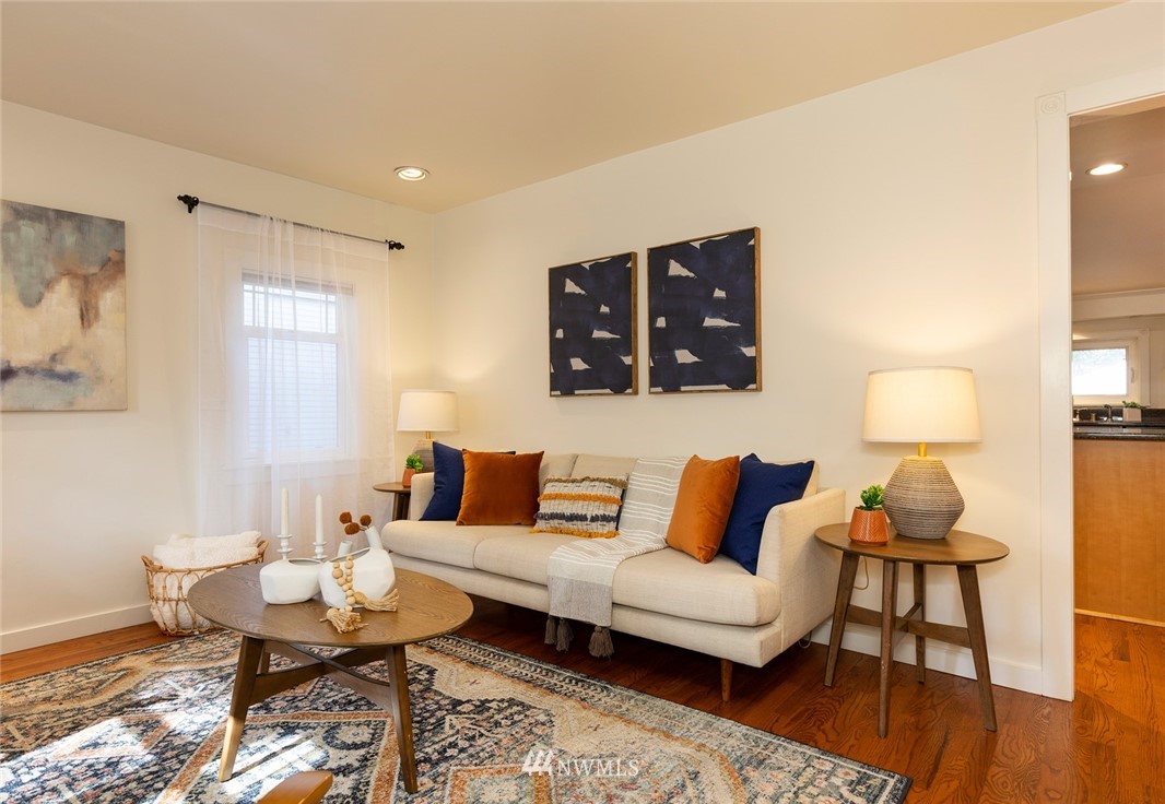 708 North 63rd Street Seattle, WA 98103 - Photo 5 of 24 a living room with furniture and wooden floor