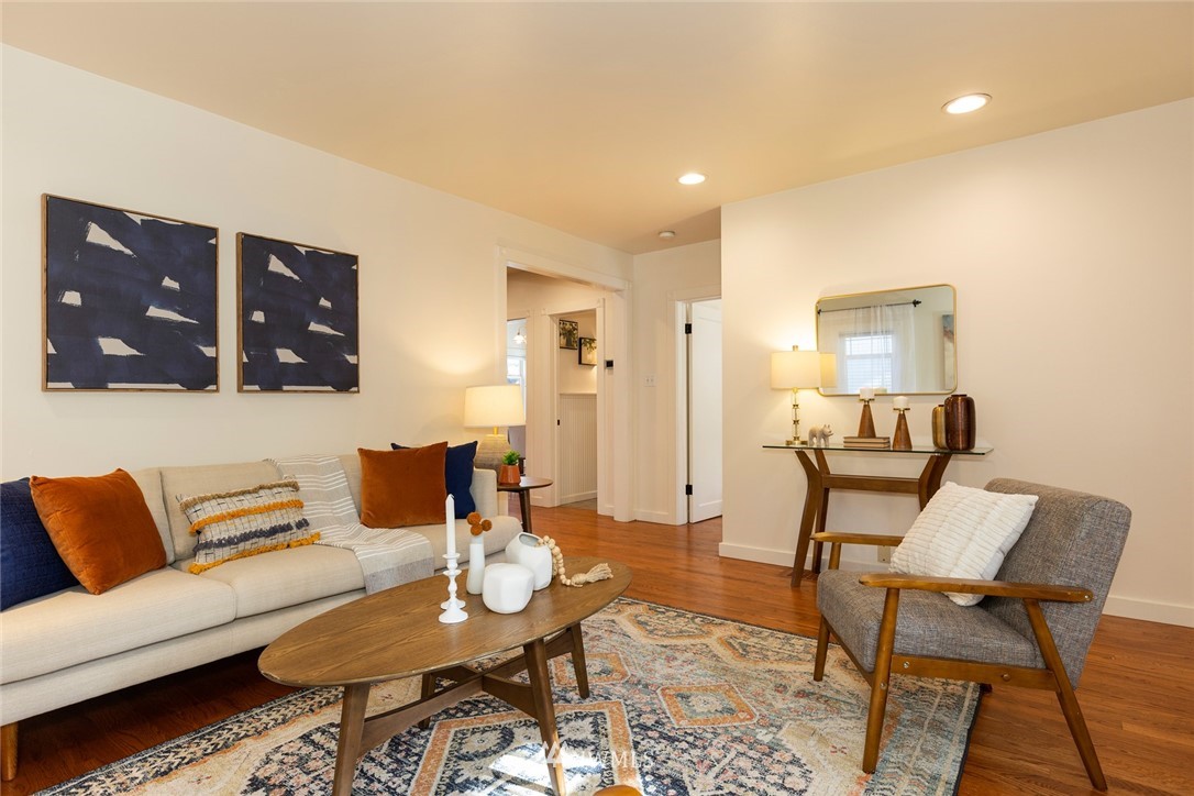 708 North 63rd Street Seattle, WA 98103 - Photo 6 of 24 a living room with furniture and wooden floor