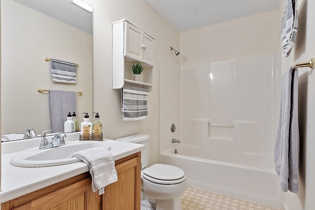 11 Longley Road, Unit I1 Shirley, MA 01464 - Photo 17 of 28 a bathroom with a sink toilet and shower