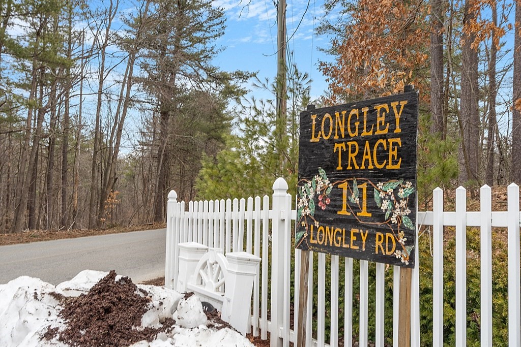 11 Longley Road, Unit I1 Shirley, MA 01464 - Photo 22 of 28 a view of a street sign of a park