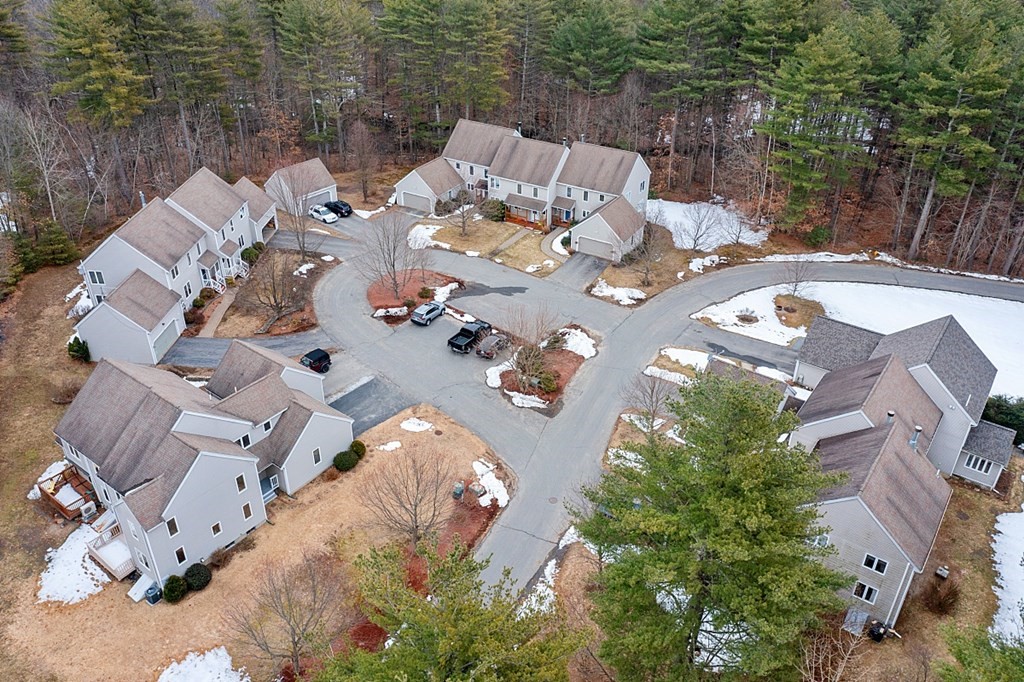 11 Longley Road, Unit I1 Shirley, MA 01464 - Photo 24 of 28 an aerial view of a house with backyard and outdoor space
