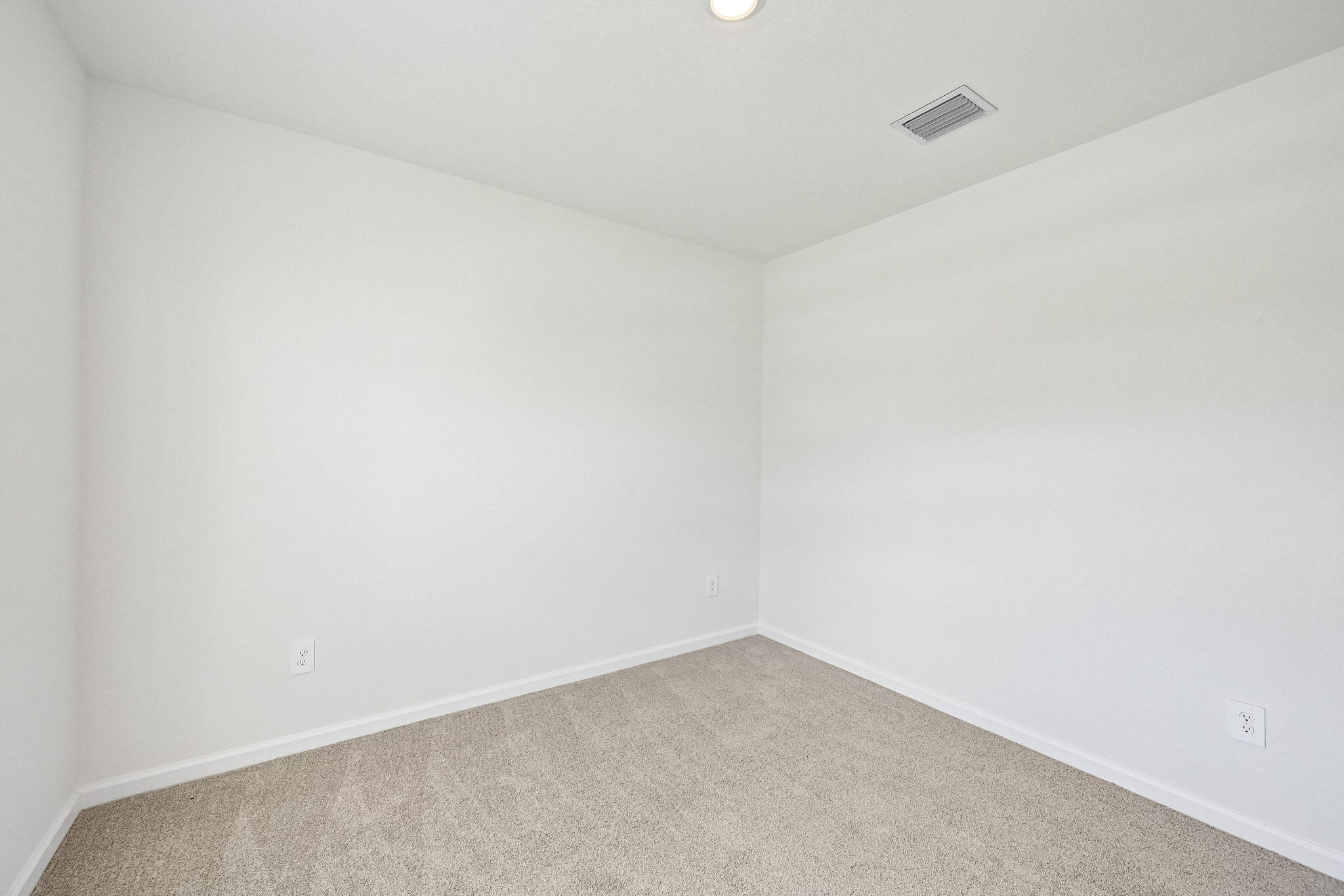 14503 Southwest New Dawn Road Indiantown, FL 34956 - Photo 18 of 42 a view of an empty room