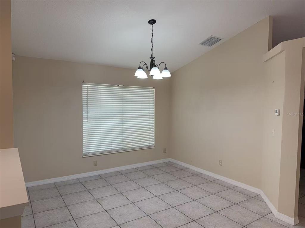 9717 Crenshaw Circle Clermont, FL 34711 - Photo 3 of 11 a view of a room with window