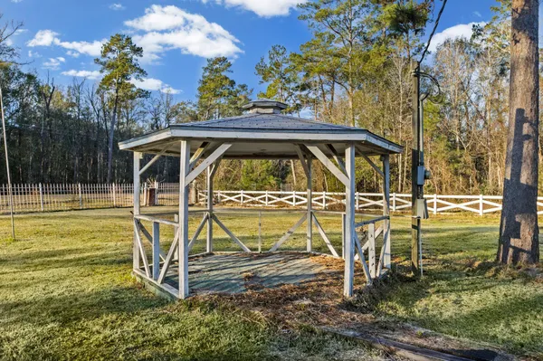 a view of swimming pool with a yard
