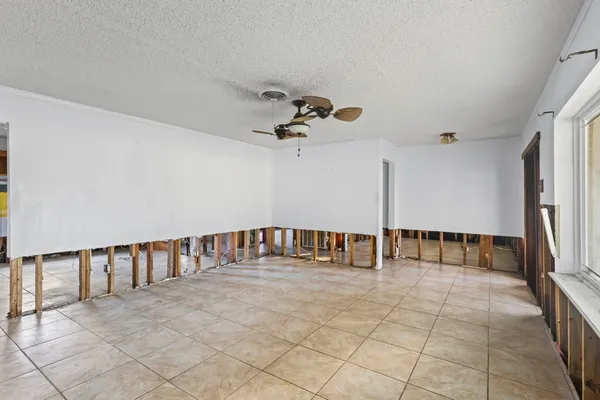 a view of staircase with a rug