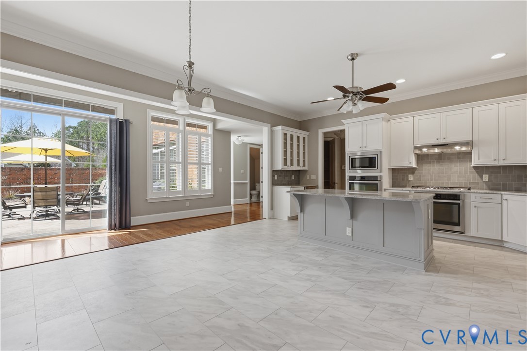 453 Bel Bridge Circle Midlothian, VA 23113 - Photo 21 of 39 Granite counters, gas cooking, and another access