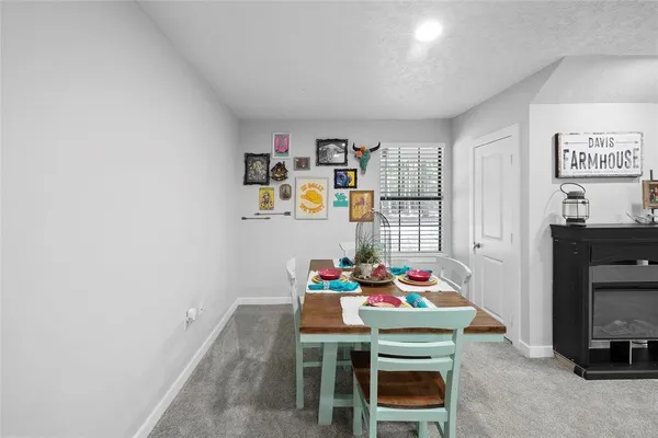a room with furniture and gym equipment
