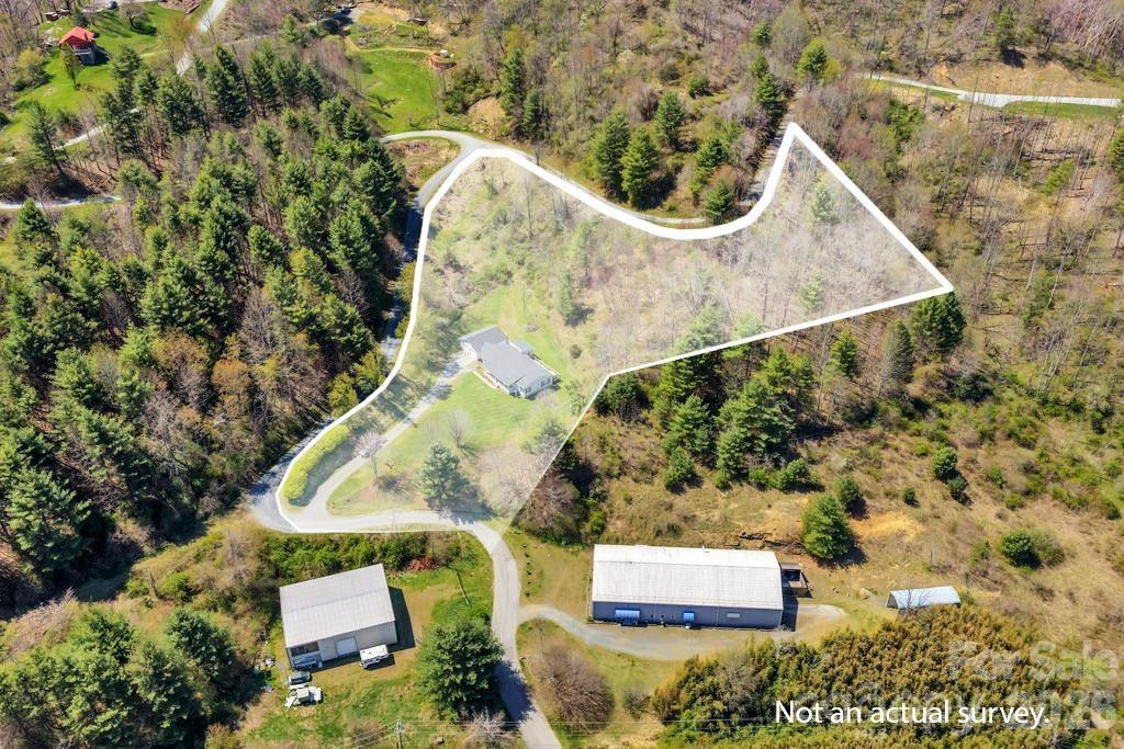 228 Vilas Overlook, Unit 1 Vilas, NC 28692 - Photo 13 of 48 an aerial view of house with yard