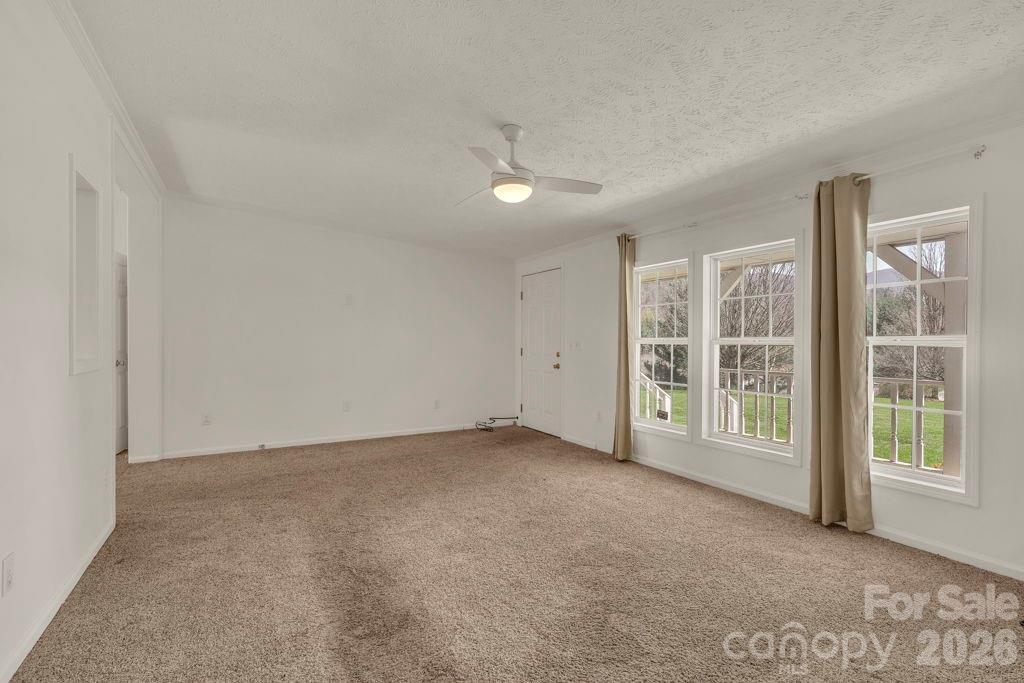 228 Vilas Overlook, Unit 1 Vilas, NC 28692 - Photo 14 of 48 an empty room with windows