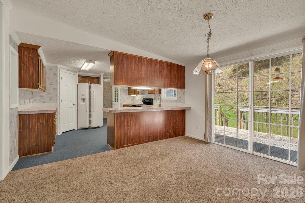 228 Vilas Overlook, Unit 1 Vilas, NC 28692 - Photo 21 of 48 a view of kitchen and window